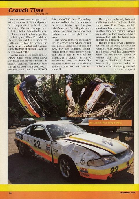 1995 Ford Mustang - A race car sits damaged after an incident, with another vehicle overturned nearby.