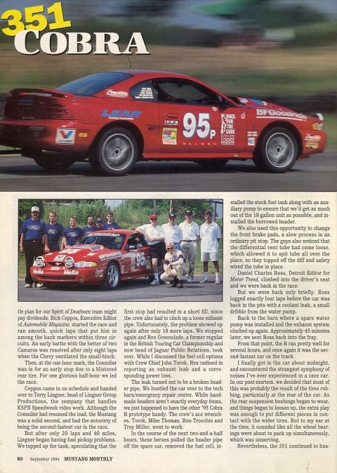 1995 Ford Mustang - A red 1995 Ford Mustang Cobra race car, identified as '351 COBRA', is shown with its team.