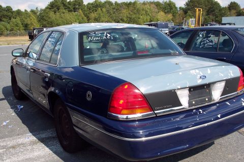 1991 Ford LTD Crown Victoria - Rear view of a 1991 Ford Crown Victoria LTD with a two-tone paint scheme.