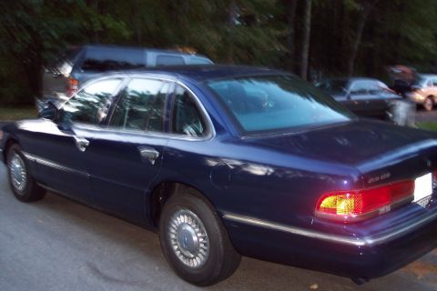 1991 Ford LTD Crown Victoria - This Ford Crown Victoria has a distinctive rear end design, likely from the mid-1990s.
