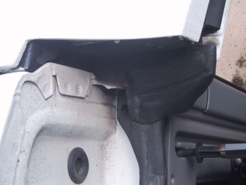 1994 Ford Bronco - Detail of the tailgate weather stripping and surrounding door frame.