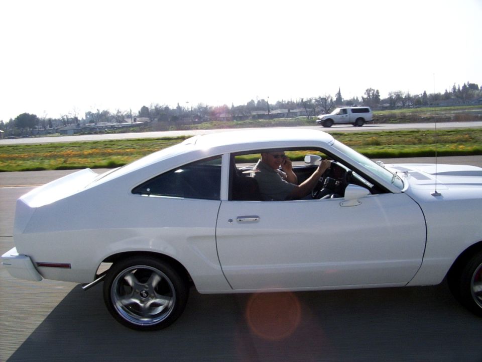 White 1978 Ford Mustang II coupe side view