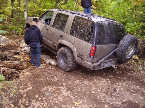 2000 Chevrolet Tahoe - This SUV is covered in mud after getting stuck on an off-road trail.