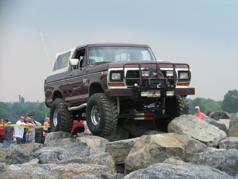1992 Ford Bronco - Modified Ford Bronco tackling a challenging rock crawling course.