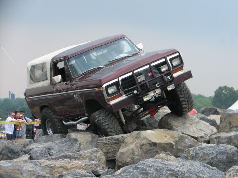 1992 Ford Bronco - A modified Ford Bronco navigates a challenging rock crawling course.