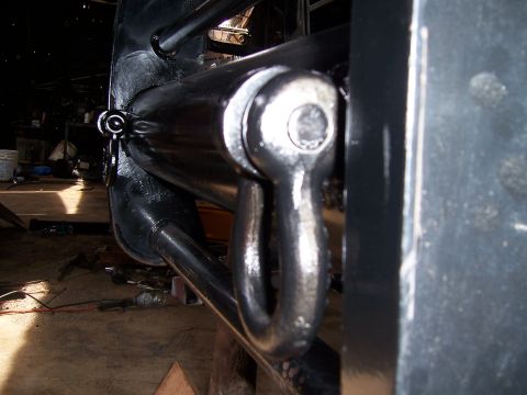 1983 Ford Bronco - A heavy-duty tow shackle is mounted to the vehicle's frame, ready for towing or recovery operations.