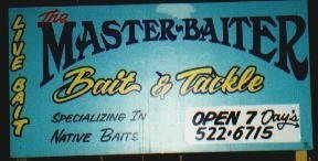 1988 Ford Bronco - A sign advertises 'The Master Baiter' Bait & Tackle shop, open daily with a phone number provided.