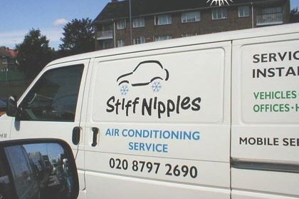 1988 Ford Bronco - A white van displays 'Stiff Nipples Air Conditioning Service' and a phone number.