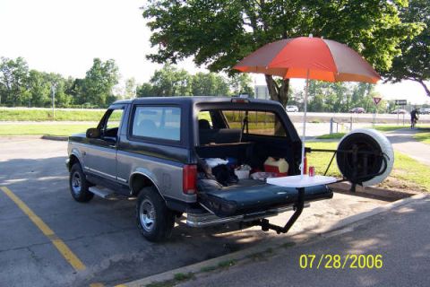 1996 Ford Bronco - the 94 at the park with a combo bike rack / table. The darn table & umbrella gets more attention then the bronco!