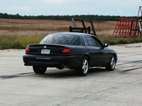 2001 Mercury Grand Marquis - Black Mercury Marauder seen from the rear.