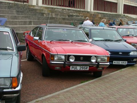 2001 Ford Fiesta - This red coupe, identified by its license plate PUL 295R, appears to be a 1977 model, not a 2001 Ford Fiesta.