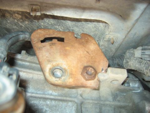 1992 Ford Bronco - Notched the detent bracket for the shifter off of an earlier 13-56, this one was probably from an AOD. This will now clear the tab on my E4…