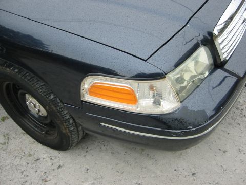 1999 Ford Crown Victoria - Has some damage in the front bumper area