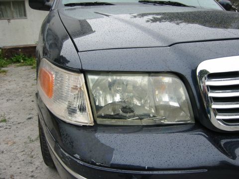 1999 Ford Crown Victoria - Original broken headlight