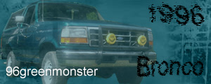1996 Ford Bronco - A 1996 Ford Bronco is shown from the front, with decorative smiley face lights attached to the grille.
