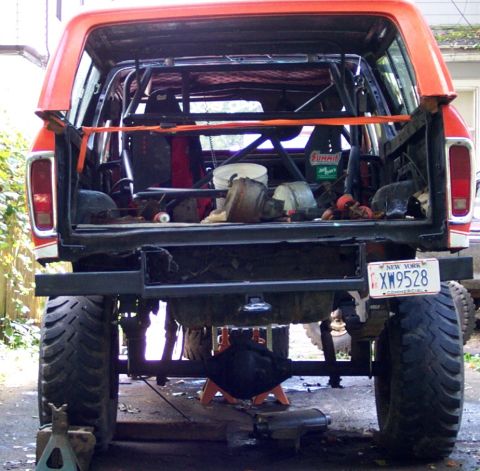 1978 Ford Bronco - This modified 1978 Ford Bronco is seen from the rear, a roll cage and lifted suspension.