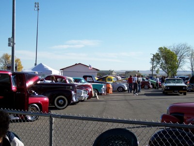 1972 Ford Ranchero - A variety of classic automobiles are on display at an outdoor event.