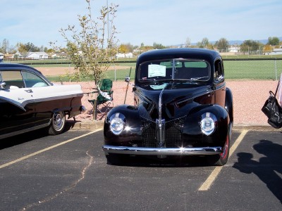 1972 Ford Ranchero - Two classic Ford cars are parked side-by-side at an outdoor event.