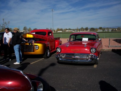 1972 Ford Ranchero - Two classic American vehicles are displayed at an outdoor event.