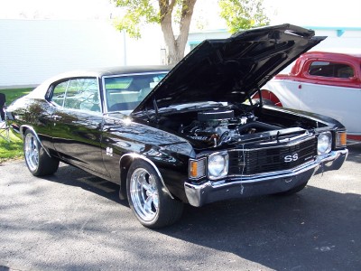 1972 Ford Ranchero - A black coupe with its hood open, revealing the engine and an SS badge on the grille.