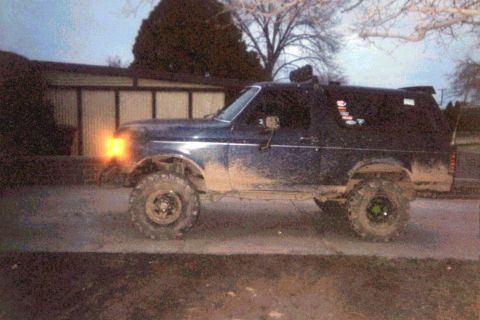1987 Ford Bronco - This 1987 Ford Bronco is covered in mud, its off-road capabilities and appearance.