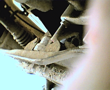 1987 Ford Bronco - Rusted metal parts are visible in this close-up shot, with a Supermotors.net logo in the corner.