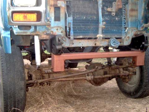 1984 Ford Bronco - Trimmed 3/8" off front of F350 leaf springs to fit crossmember