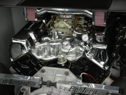 1992 Ford Crown Victoria - Close-up of a modified engine with chrome valve covers and intake manifold, custom labels.