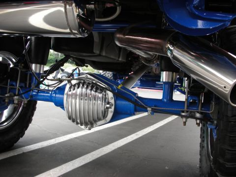1992 Ford Crown Victoria - Customized rear axle assembly with polished chrome differential cover and large exhaust pipes.