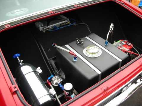 1992 Ford Crown Victoria - Custom trunk setup with fuel cell, nitrous bottle, and amplifier visible.