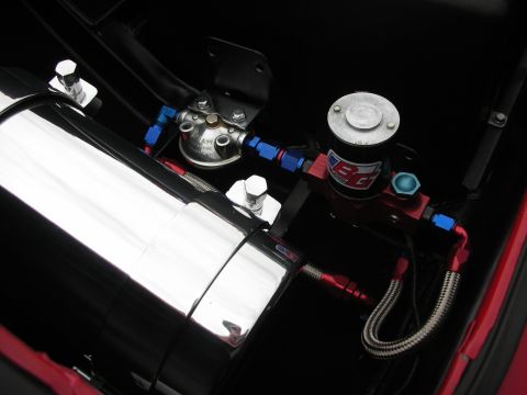 1992 Ford Crown Victoria - Custom air suspension components are visible in this close-up shot, a polished chrome tank and a BG air compressor.