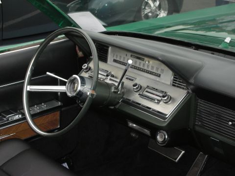 1992 Ford Crown Victoria - Classic car interior shows a detailed dashboard with a prominent steering wheel and vintage radio.