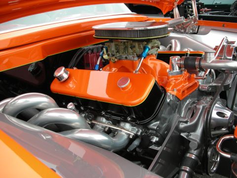 1992 Ford Crown Victoria - Custom V8 engine with bright orange valve covers and polished chrome exhaust headers.