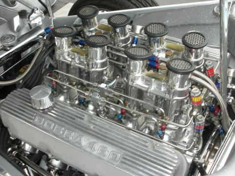 1992 Ford Crown Victoria - The engine features a Cobra 460 valve cover and a setup with eight individual air intakes.