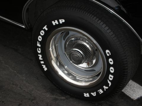1992 Ford Crown Victoria - Goodyear Wingfoot HP tire mounted on a shiny chrome wheel.