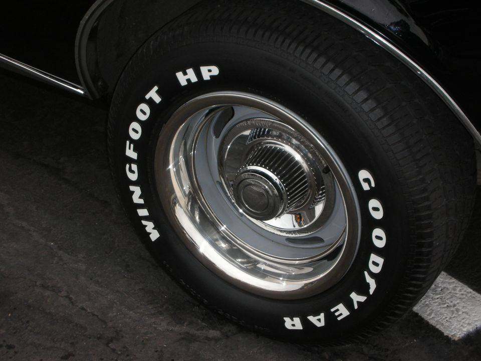 Close-up of a Goodyear Wingfoot HP tire on a chrome wheel