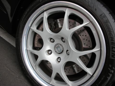 1992 Ford Crown Victoria - A detailed view of a custom wheel, tire, and braking system on a vehicle.
