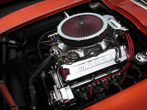 1992 Ford Crown Victoria - Close-up of a polished engine bay with a prominent air filter and "MPROS" branding.