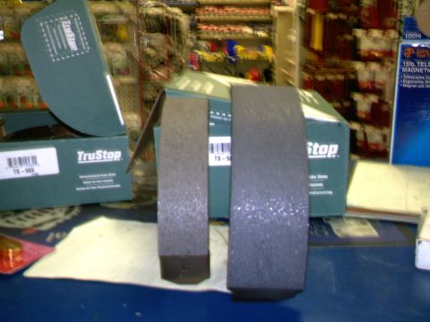 1987 Ford Bronco II - TruStop brake shoes are shown with their packaging in the background.