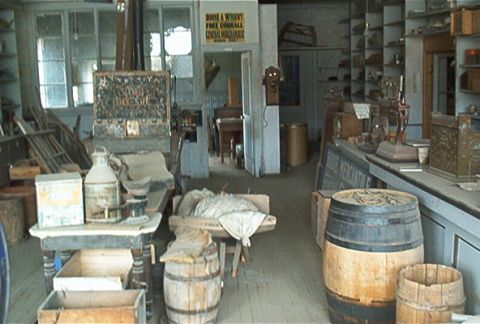 1986 Ford Bronco - This general store scene contains barrels, scales, and shelves filled with various items.