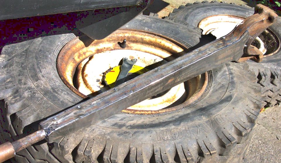 Metal part resting on tires