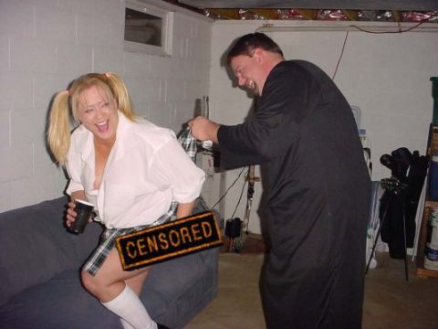 1995 Ford Probe - A humorous scene unfolds in a basement setting, with a censored sign obscuring part of the image.