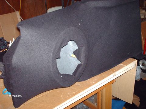 1995 Ford Probe - A custom speaker enclosure, likely for a car's interior, is shown covered in black fabric with a large circular opening.
