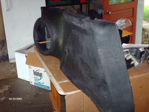 1995 Ford Probe - Custom black speaker enclosure with a circular cutout, likely for a car interior modification.