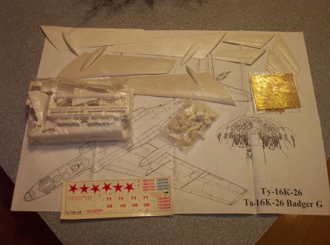 1998 Ford Crown Victoria - This image shows the unassembled parts and instructions for a Tu-16K-26 Badger G model airplane kit.