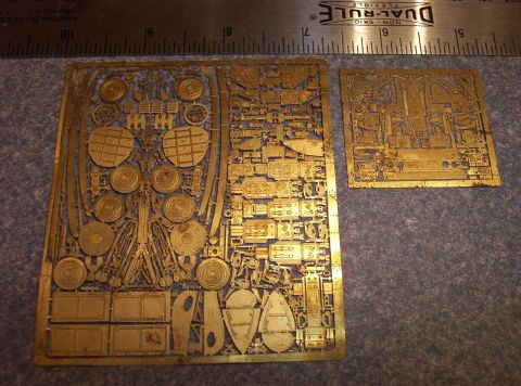 1998 Ford Crown Victoria - Two sheets of photo-etched brass model parts are shown next to a ruler, indicating their scale and detail.