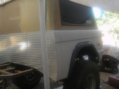 1966 Ford Bronco - side windows tinted using rustoleum flat black on the inside.