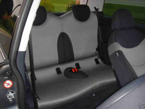 2003 MINI Cooper - Interior view of the rear seats in a 2003 MINI Cooper.