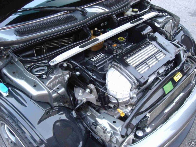MINI Cooper engine bay with MINI-branded cover and strut brace