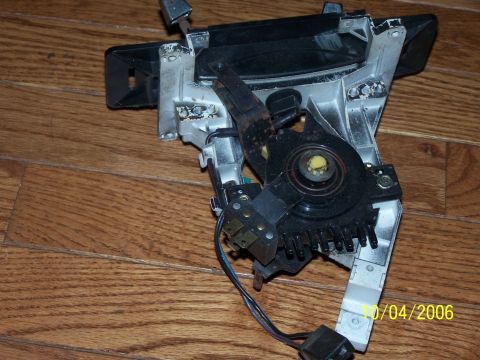 1979 Ford F-150 - This is a close-up view of an automatic transmission shifter assembly, showing its mechanical components and wiring.